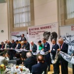 Distinguished guests and organization representatives cut ribbon to mark opening of National Memories exhibition